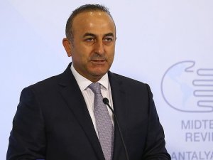 Çavuşoğlu'ndan ABD askerlerinin YPG arması kullanmasına tepki