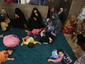 Felluce'deki çatışmalardan Fırat'ı aşarak kurtuluyorlar