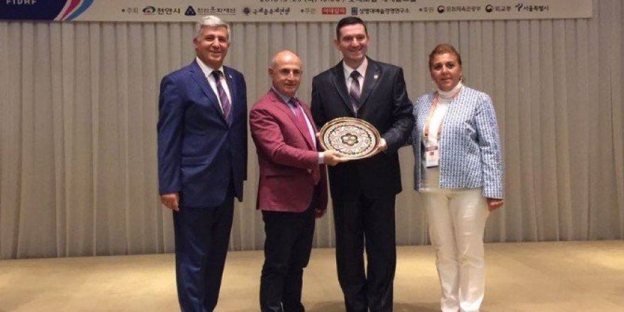 Başkan Akgün’e Kore’de büyük onur