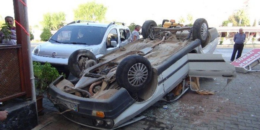 Takla atan otomobilden şans eseri kurtuldu