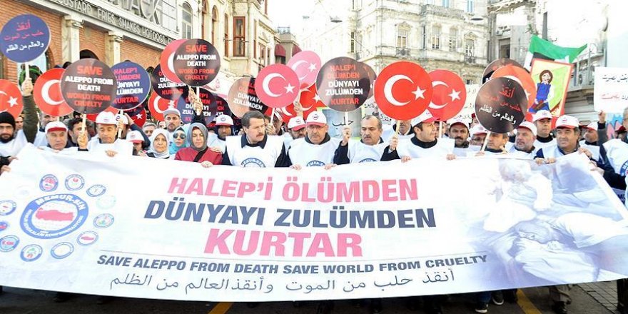 Halep'teki sivillere yönelik saldırılara tepki yürüyüşü