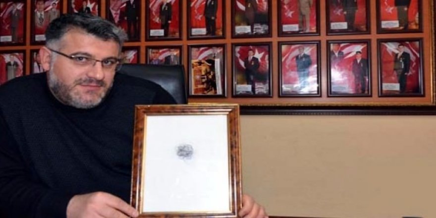 Şehit annesinin saçları tablo oldu