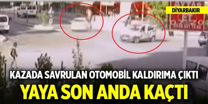 Görüntüler Diyarbakır'dan...Kazada savrulan otomobil kaldırıma çıktı, yaya son anda kaçtı