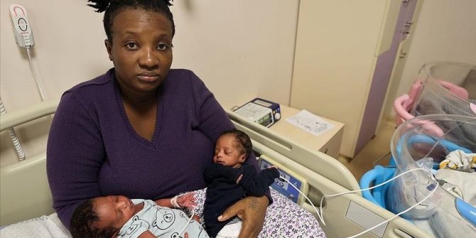 Escaping death at sea, asylum seeker gives birth to twins