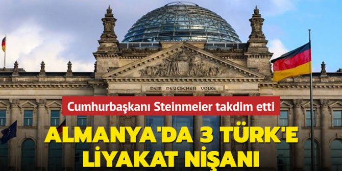 Almanya'da üç Türk'e liyakat nişanı verildi