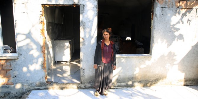 Mersin'de iki çocuk annesi kadın, evinin akrabaları tarafından yakıldığını iddia etti