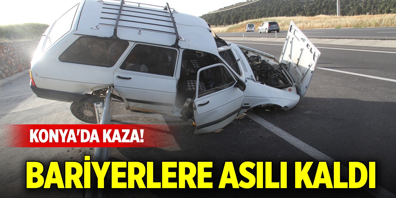 Konya'da kaza! Otomobil bariyerlere asılı kaldı