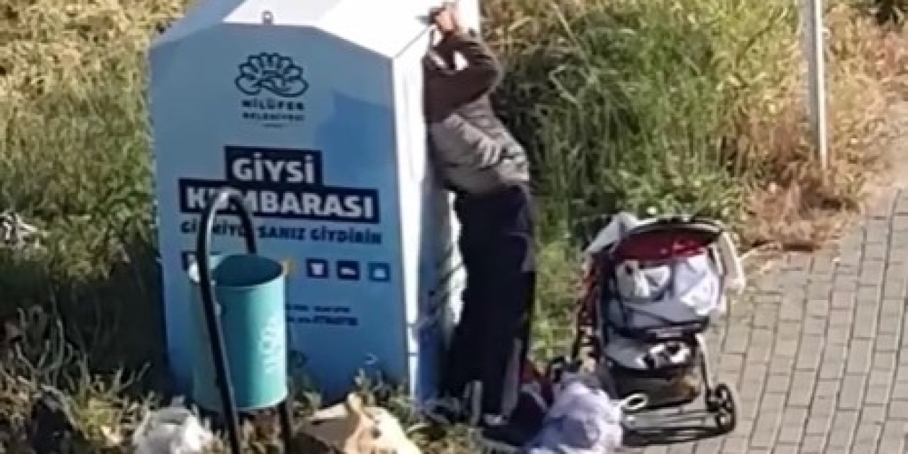 Giysi kumbarasından kıyafet çaldılar