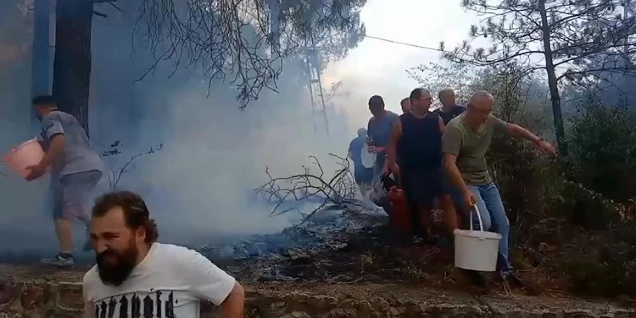 Mahalleli birlik oldu, kovalarla müdahale etti