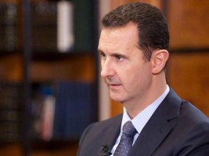 Syria's Assad admits sending weapons to PYD