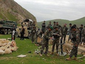 Afghan forces wrest key district from Taliban