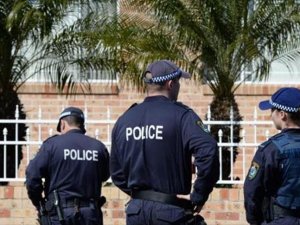 Australian police shoot armed man dead at station