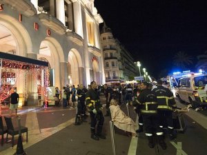 At least 80 dead as truck crashes into crowd in France