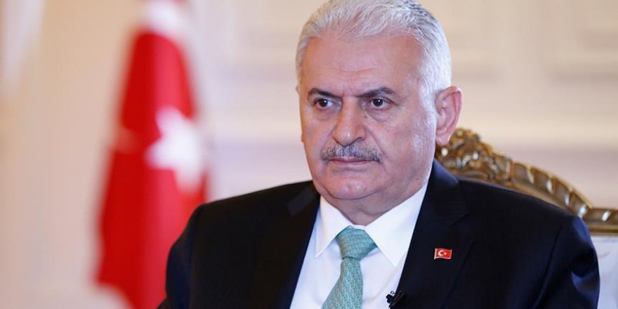 Turkish PM: Trump says wrong to provide arms to YPG