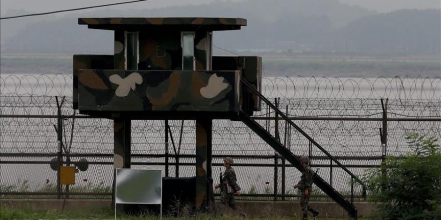 Shots at Koreas' border after new escape from North