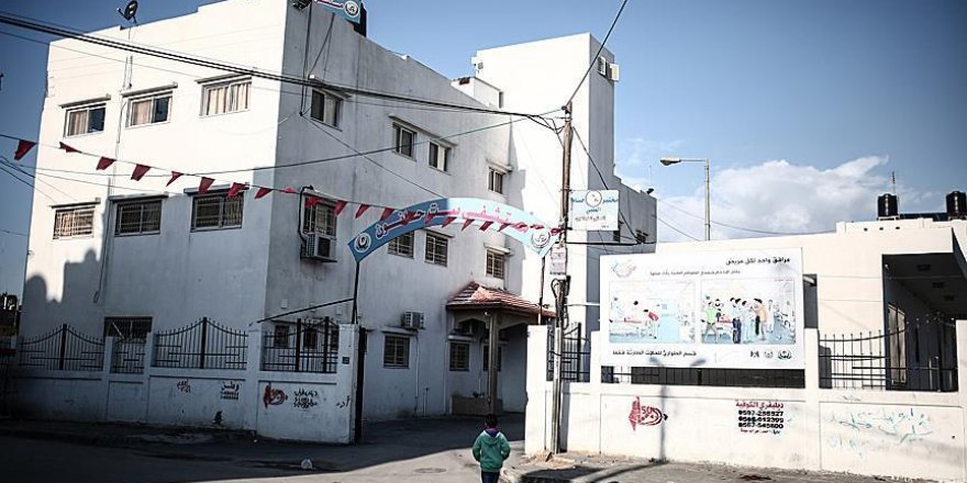 Gaza Strip hospital cleaners strike for back pay