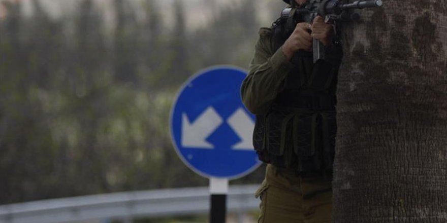 Israeli forces fire grenade at couple holding baby