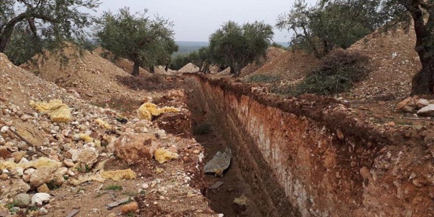 Terrorists force Afrin residents to dig ditches