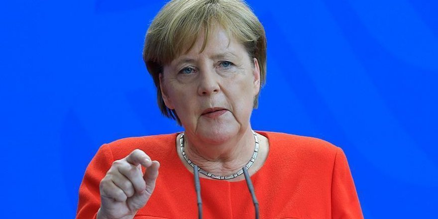 Merkel unmoved as Trump demands more defense spending