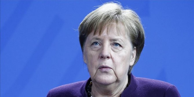 Racism is poison, it exits in our society, admits Merkel