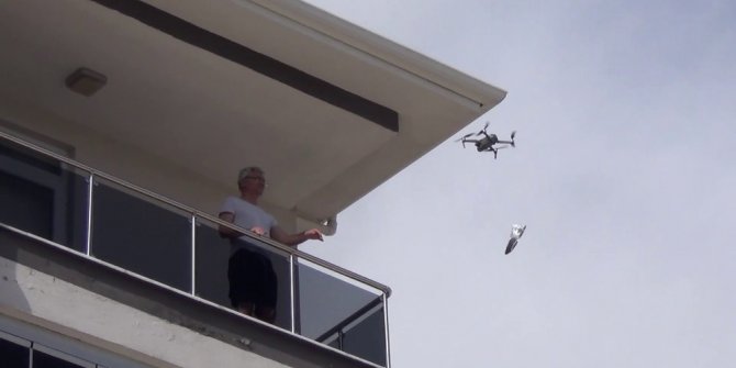 Çorum’da evden çıkamayanlara drone ile maske servisi