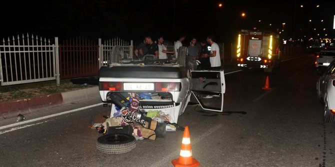 Takla atan araçtan emniyet kemeri sayesinde yara almadan kurtuldu