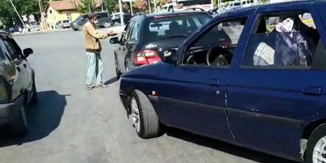 Kolunu saklayarak dilenirken JASAT ekibine yakalandı