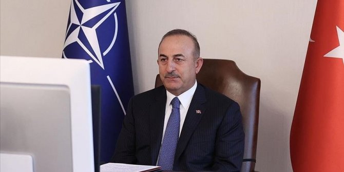 Turkish foreign minister attends NATO meeting ahead of leaders' summit