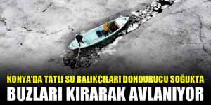 Konya'da tatlı su balıkçıları dondurucu soğukta buzları kırarak avlanıyor