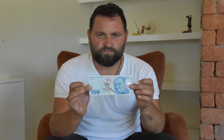 ATM'den çektiği 100 lira baskı hatalı çıktı