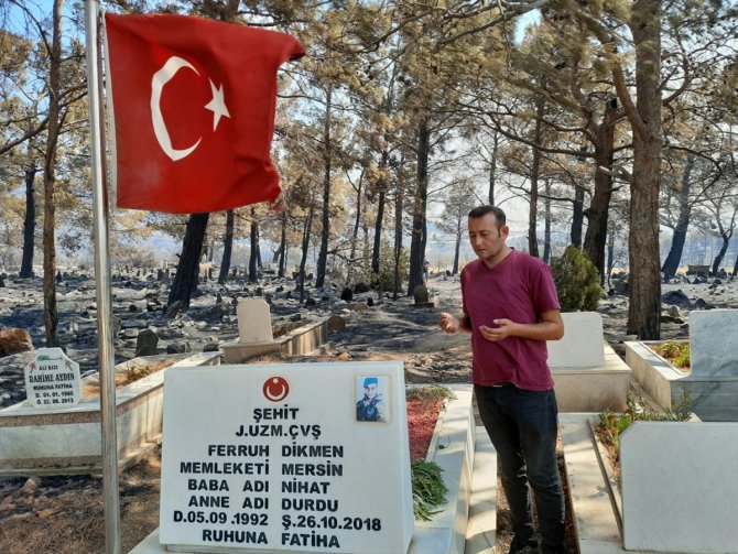 Orman yangınında şehit kabri ve Türk bayrağı zarar görmedi!