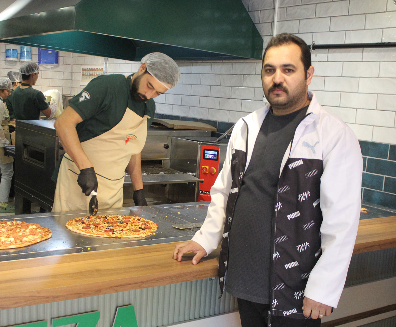 murat-turkmen-sun-brothers-pizza.jpg