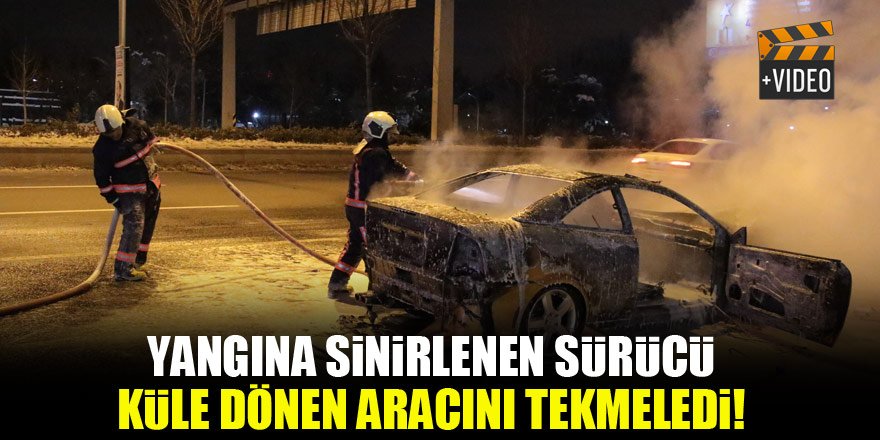 Yangına sinirlenen sürücü küle dönen aracını tekmeledi!